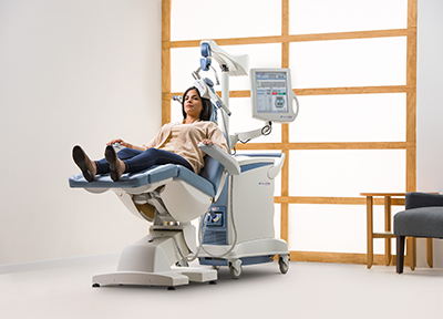 NeuroStar Advanced Therapy: Patient reclines in treatment chair